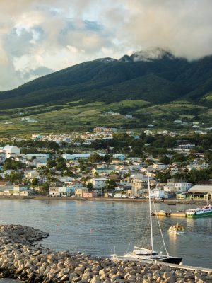 Basseterre, St Kitts with Mt Liamuiga volcano in the background at sunset.