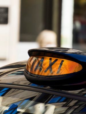cloce-up-of-an-illuminated-taxi-sign-2024-09-12-00-15-18-utc-scaled.jpg