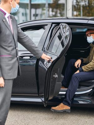 man-in-eyeglasses-getting-out-of-the-elite-taxi-2025-03-09-07-58-28-utc-scaled.jpg