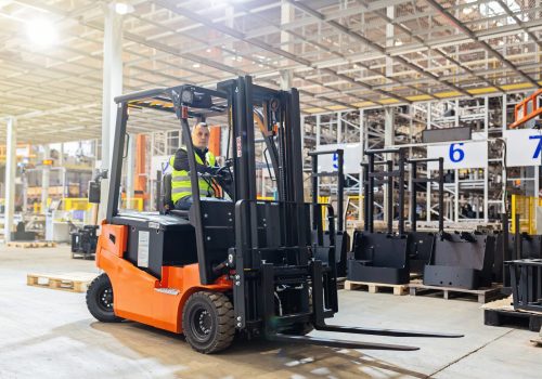 storehouse-employee-in-uniform-working-on-forklift-2024-11-07-13-19-21-utc