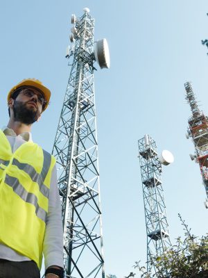 telecom-worker-inspecting-towers-on-a-clear-day-2026-03-20-00-15-46-utc